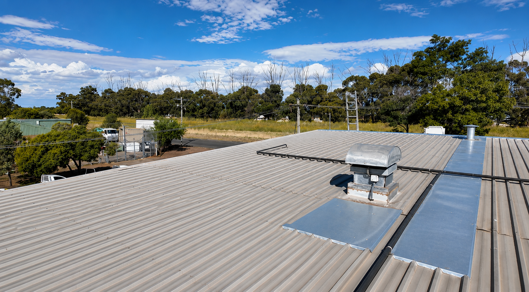 Completed commercial metal roofing system on a building in regional NSW