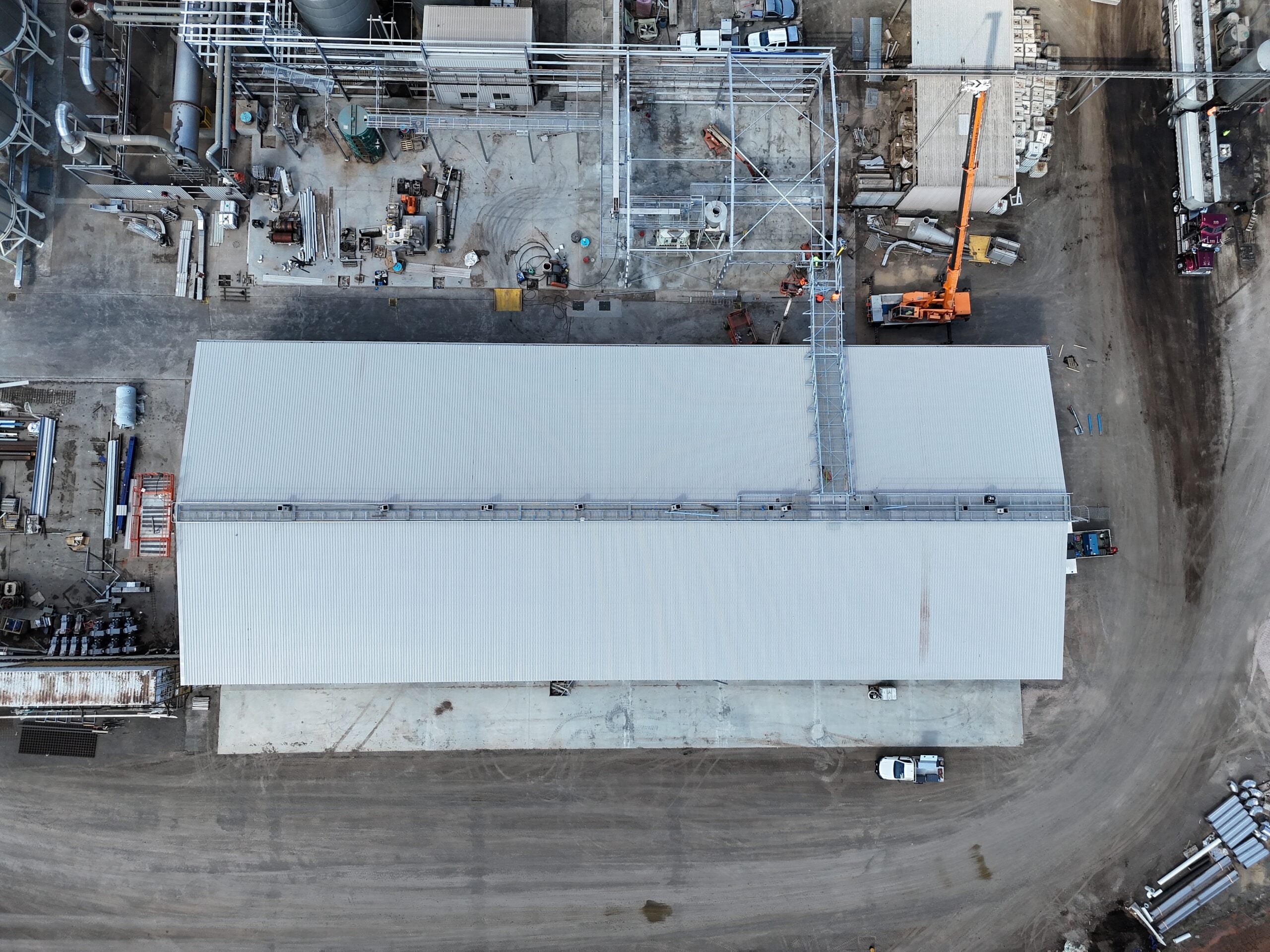 Aerial view of a commercial roofing project by BB Building Services