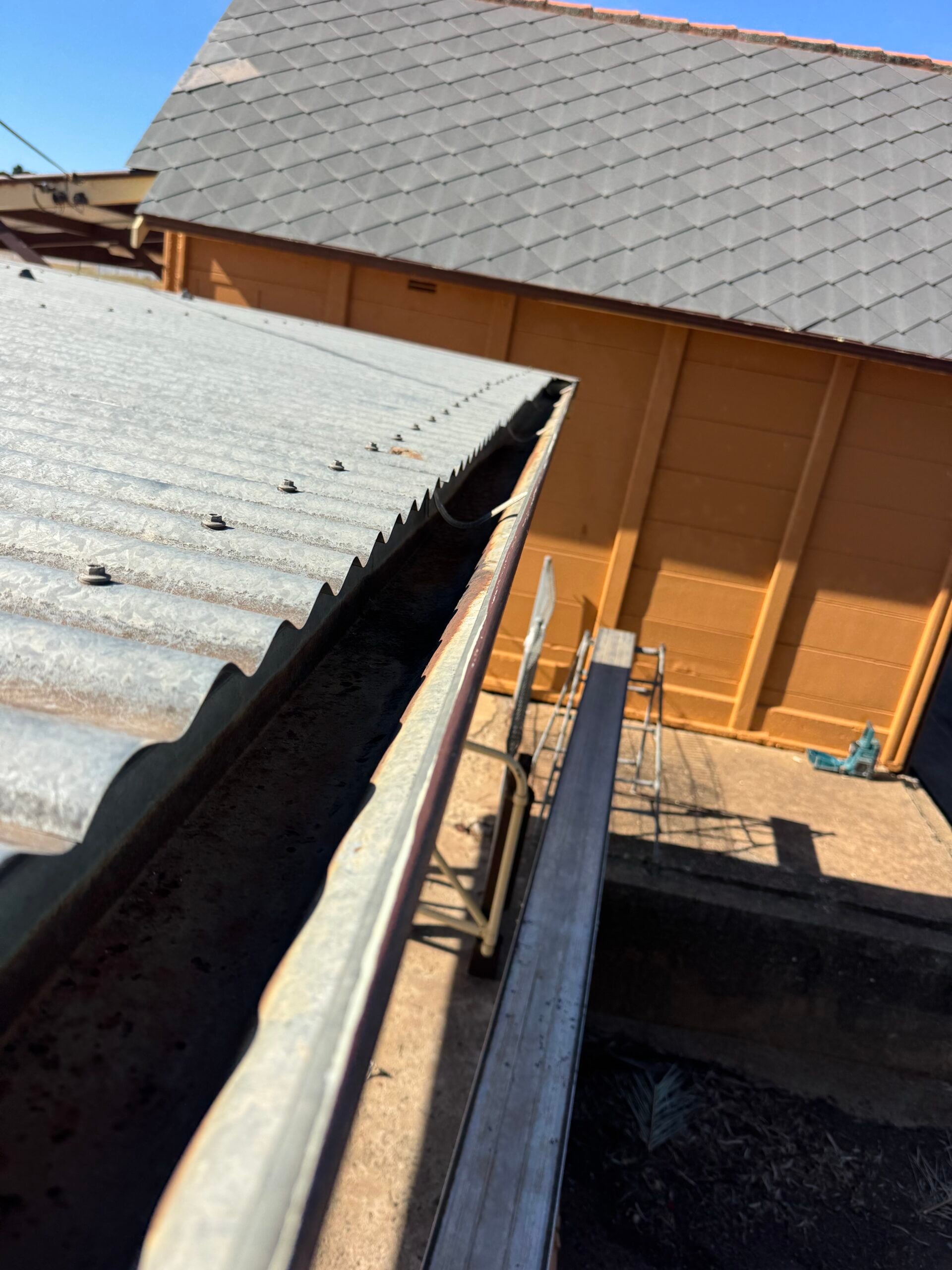 New guttering and downpipe installation
